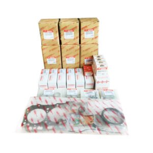 OEM overhaul rebuild kit for Isuzu 3KC1 engines used in Nissan SB15 mini-excavators. Includes all critical components for a complete engine rebuild.